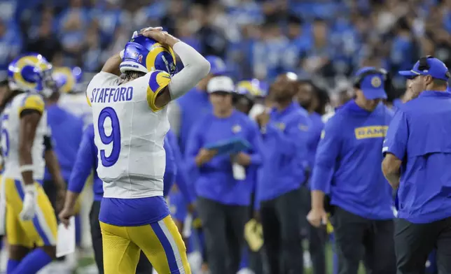 Los Angeles Rams quarterback Matthew Stafford (9) walks to the sidelines against the Detroit Lions in the second half of an NFL football game in Detroit, Sunday, Sept. 8, 2024. (AP Photo/Duane Burleson)