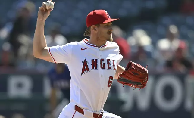 Los Angeles Angels' pitcher Jack Kochanowicz delivers in the first inning of a baseball game against the Texas Rangers, Sunday, Sept. 29, 2024, in Anaheim, Calif. (AP Photo/John McCoy)