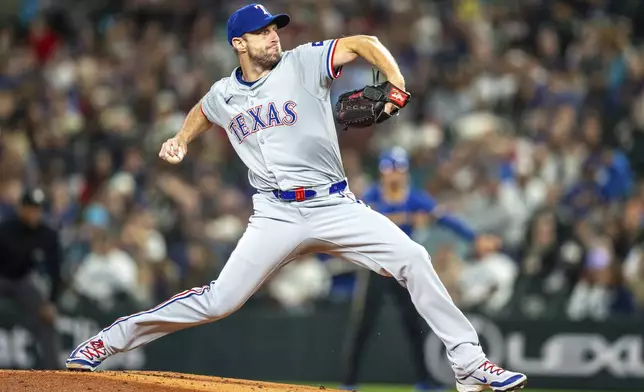 Texas Rangers starter Max Scherzer delivers a pitch during the first inning of a baseball game against the Texas Rangers, Saturday, Sept. 14, 2024, in Seattle. (AP Photo/Stephen Brashear)