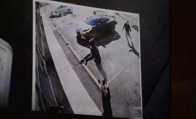 Photo evidence is displayed during the murder trial of Justin Johnson, accused of killing rapper Young Dolph, Tuesday, Sept. 24, 2024, in Memphis, Tenn. (AP Photo/George Walker IV, Pool)