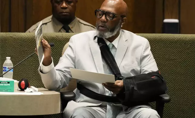 Retired Memphis Police officer Terence Dabney testifies during the murder trial of Justin Johnson, accused of killing rapper Young Dolph, Tuesday, Sept. 24, 2024, in Memphis, Tenn. (AP Photo/George Walker IV, Pool)