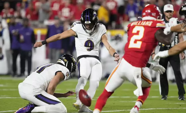 Baltimore Ravens kicker Justin Tucker (9) makes a 25-yard field goal during the first half of an NFL football game against the Kansas City Chiefs Thursday, Sept. 5, 2024, in Kansas City, Mo. (AP Photo/Ed Zurga)