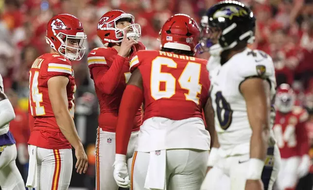 Kansas City Chiefs kicker Harrison Butker celebrates after making a 31-yard field goal during the first half of an NFL football game against the Baltimore Ravens Thursday, Sept. 5, 2024, in Kansas City, Mo. (AP Photo/Charlie Riedel)