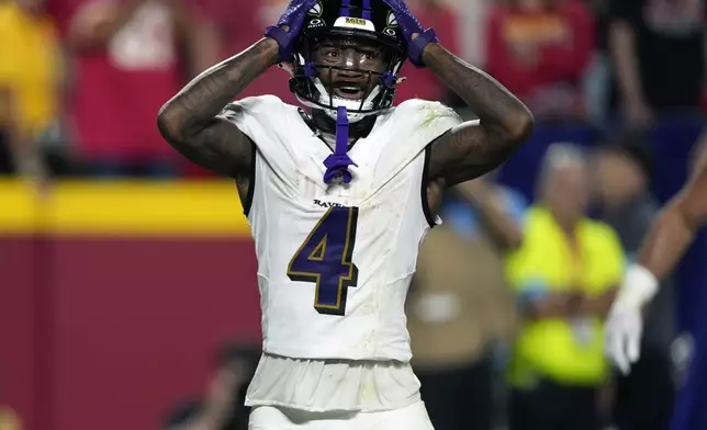 Baltimore Ravens wide receiver Zay Flowers reacts after missing a pass in the end zone late in the second half of an NFL football game against the Kansas City Chiefs Thursday, Sept. 5, 2024, in Kansas City, Mo. (AP Photo/Charlie Riedel)