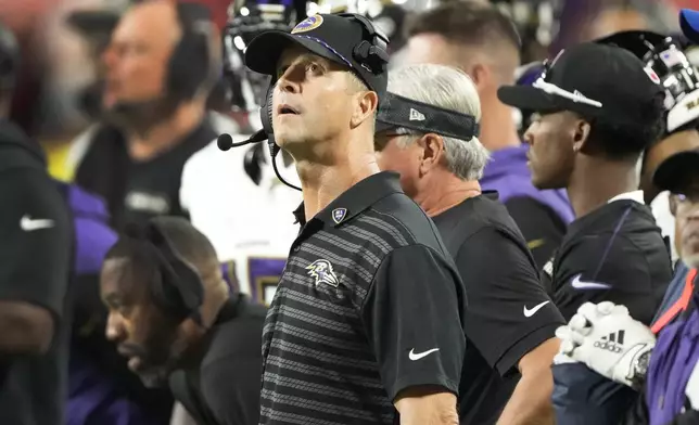 Baltimore Ravens head coach John Harbaugh watches from the sidelines during the second half of an NFL football game against the Kansas City Chiefs Thursday, Sept. 5, 2024, in Kansas City, Mo. (AP Photo/Charlie Riedel)