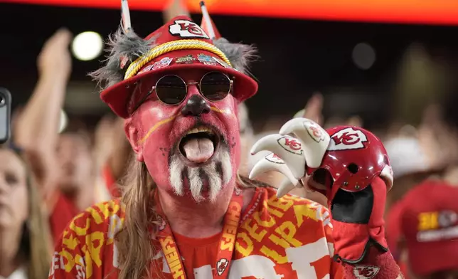 A fan is seen before the start of an NFL football game between the Kansas City Chiefs and the Baltimore Ravens Thursday, Sept. 5, 2024, in Kansas City, Mo. (AP Photo/Charlie Riedel)