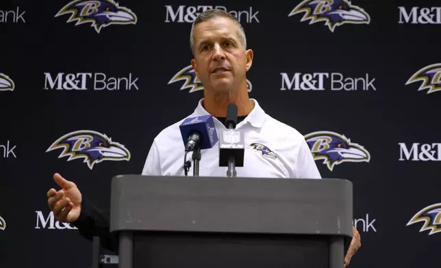 Baltimore Ravens head coach John Harbaugh responds to questions in a news conference after the team's NFL football game against the Dallas Cowboys in Arlington, Texas, Sunday, Sept. 22, 2024. (AP Photo/Gareth Patterson)