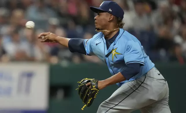 Tampa Bay Rays' Edwin Uceta pitches in the ninth inning of a baseball game against the Cleveland Guardians, Friday, Sept. 13, 2024, in Cleveland. (AP Photo/Sue Ogrocki)