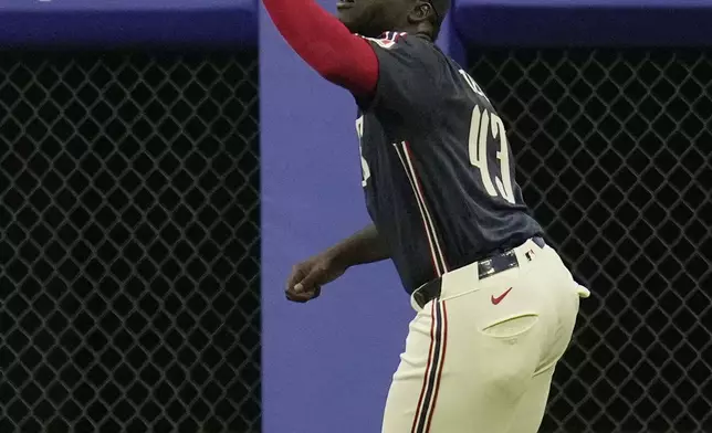 Cleveland Guardians right fielder Jhonkensy Noel catches a fly ball hit for an out against Tampa Bay Rays' Jonathan Aranda in the second inning of a baseball game Friday, Sept. 13, 2024, in Cleveland. (AP Photo/Sue Ogrocki)