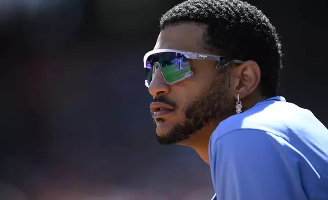 Tampa Bay Rays'' Jose Siri looks on from the dugout during the second inning of a baseball game against the Baltimore Oriole, Sunday, Sept. 8, 2024, in Baltimore. (AP Photo/Nick Wass)