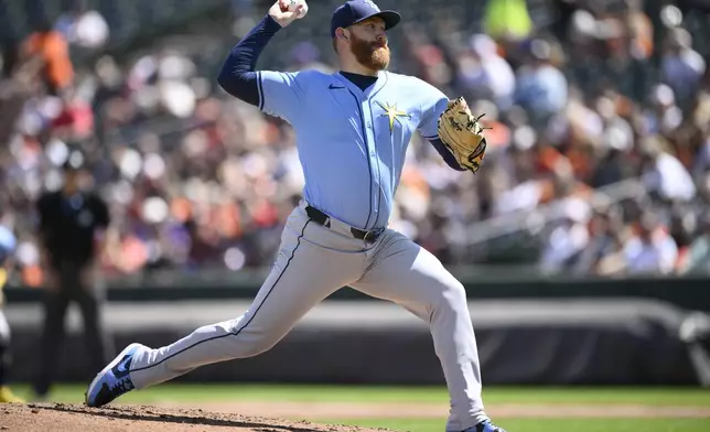 Tampa Bay Rays starting pitcher Zack Littell throws during the second inning of a baseball game against the Baltimore Orioles, Sunday, Sept. 8, 2024, in Baltimore. (AP Photo/Nick Wass)