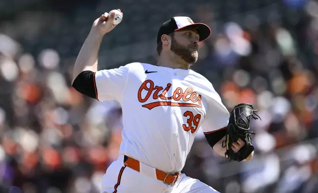 Baltimore Orioles starting pitcher Corbin Burnes throws during the second inning of a baseball game against the Tampa Bay Rays, Sunday, Sept. 8, 2024, in Baltimore. (AP Photo/Nick Wass)