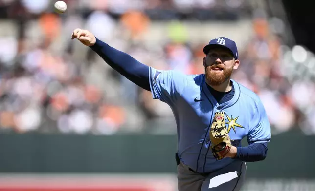 Tampa Bay Rays starting pitcher Zack Littell throws during the first inning of a baseball game against the Baltimore Orioles, Sunday, Sept. 8, 2024, in Baltimore. (AP Photo/Nick Wass)