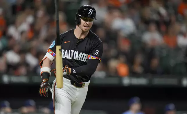 Baltimore Orioles' Ryan O'Hearn throws his bat after hitting a flyout to Tampa Bay Rays center fielder Jonny DeLuca during the fourth inning of a baseball game, Friday, Sept. 6, 2024, in Baltimore. (AP Photo/Stephanie Scarbrough)