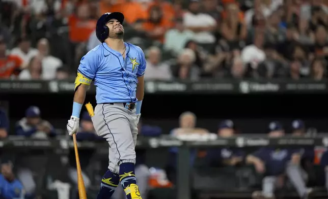 Tampa Bay Rays' Jonathan Aranda reacts after striking out swinging during the fourth inning of a baseball game against the Baltimore Orioles, Friday, Sept. 6, 2024, in Baltimore. (AP Photo/Stephanie Scarbrough)