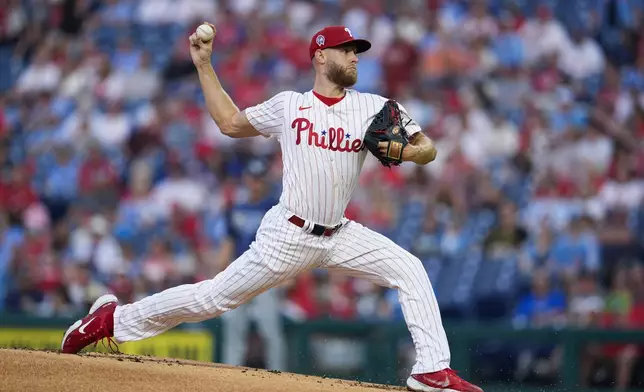 Philadelphia Phillies' Zack Wheeler throws during the first inning of a baseball game against the Tampa Bay Rays, Wednesday, Sept. 11, 2024, in Philadelphia. (AP Photo/Derik Hamilton)