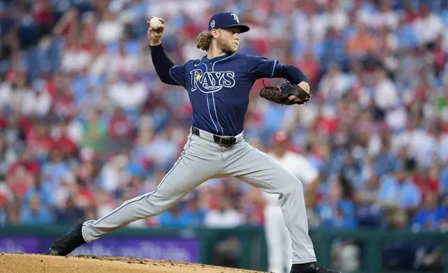 Tampa Bay Rays' Shane Baz throws during the first inning of a baseball game against the Philadelphia Phillies, Wednesday, Sept. 11, 2024, in Philadelphia. (AP Photo/Derik Hamilton)