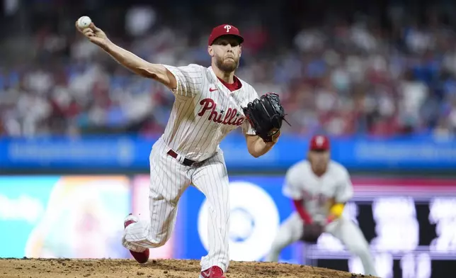 Philadelphia Phillies' Zack Wheeler throws during the fourth inning of a baseball game against the Tampa Bay Rays, Wednesday, Sept. 11, 2024, in Philadelphia. (AP Photo/Derik Hamilton)