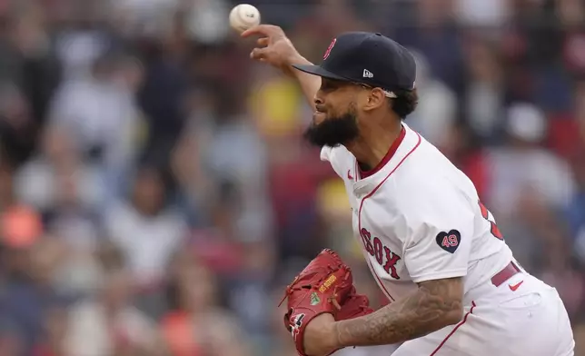 Boston Red Sox's Luis Guerrero delivers a pitch to a Tampa Bay Rays batter in the seventh inning of a baseball game, Sunday, Sept. 29, 2024, in Boston. (AP Photo/Steven Senne)