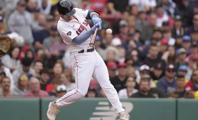 Boston Red Sox's Vaughn Grissom hits a double in the third inning of a baseball game against the Tampa Bay Rays, Sunday, Sept. 29, 2024, in Boston. (AP Photo/Steven Senne)