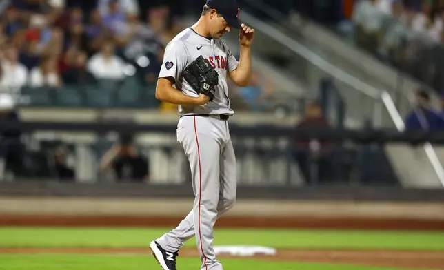 Boston Red Sox pitcher Rich Hill (44) reacts after walking in a run during the eighth inning of a baseball game against the New York Mets, Wednesday, Sept. 4, 2024, in New York. (AP Photo/Noah K. Murray)