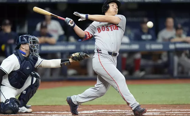 Boston Red Sox's Masataka Yoshida, of Japan, fouls off a pitch during the second inning of a baseball game against the Tampa Bay Rays Tuesday, Sept. 17, 2024, in St. Petersburg, Fla. (AP Photo/Chris O'Meara)