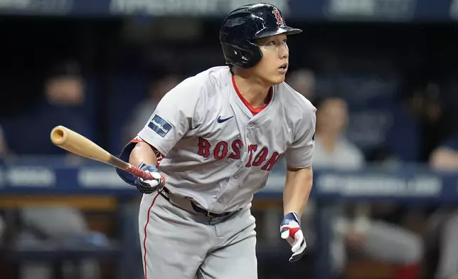 Boston Red Sox's Masataka Yoshida, of Japan, flies out to Tampa Bay Rays center fielder Jose Siri during the seventh inning of a baseball game Thursday, Sept. 19, 2024, in St. Petersburg, Fla. (AP Photo/Chris O'Meara)