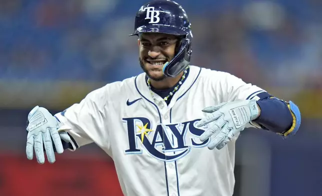 Tampa Bay Rays' Jose Siri celebrates his single off Boston Red Sox starting pitcher Brayan Bello during the third inning of a baseball game Thursday, Sept. 19, 2024, in St. Petersburg, Fla. (AP Photo/Chris O'Meara)