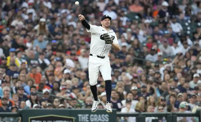 Detroit Tigers third baseman Ryan Kreidler throws to first base for an out on a Boston Red Sox Treston Casas ground ball in the eighth inning of a baseball game, Saturday, Aug. 31, 2024, in Detroit. (AP Photo/Paul Sancya)