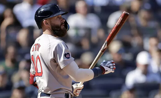 Boston Red Sox's Trevor Story reacts after striking out during the sixth inning of a baseball game against the New York Yankees, Sunday, Sept. 15, 2024, in New York. (AP Photo/Adam Hunger)