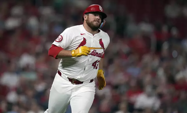 St. Louis Cardinals' Pedro Pages singles during the fifth inning of a baseball game against the Cincinnati Reds Tuesday, Sept. 10, 2024, in St. Louis. (AP Photo/Jeff Roberson)