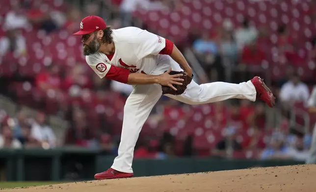 St. Louis Cardinals starting pitcher Lance Lynn throws during the first inning of a baseball game against the Cincinnati Reds Wednesday, Sept. 11, 2024, in St. Louis. (AP Photo/Jeff Roberson)