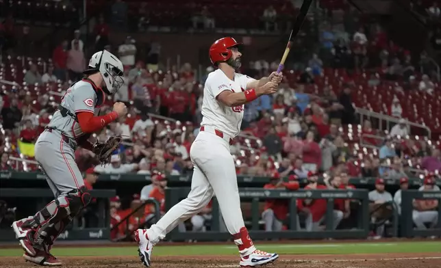 Cincinnati Reds catcher Tyler Stephenson, left, celebrates as St. Louis Cardinals' Matt Carpenter strikes out with the bases loaded to end a baseball game Tuesday, Sept. 10, 2024, in St. Louis. The Reds won 3-0. (AP Photo/Jeff Roberson)