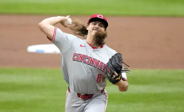 Cincinnati Reds starting pitcher Rhett Lowder delivers during the first inning of a baseball game against the Chicago Cubs on Saturday, Sept. 28, 2024, in Chicago. (AP Photo/Charles Rex Arbogast)