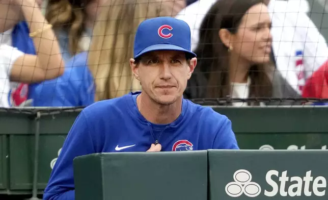 Chicago Cubs manager Craig Counsell looks out over the field during the third inning of a baseball game against the Cincinnati Reds on Saturday, Sept. 28, 2024, in Chicago. (AP Photo/Charles Rex Arbogast)