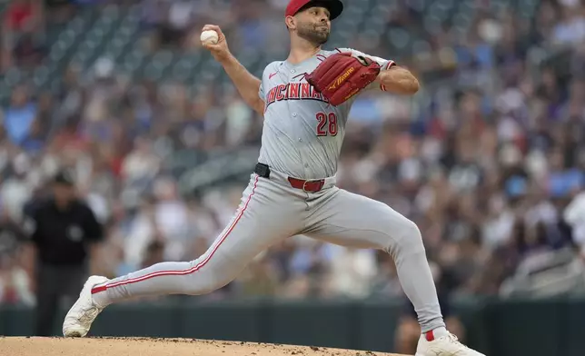 Cincinnati Reds starting pitcher Nick Martinez (28) delivers during the first inning of a baseball game against the Minnesota Twins, Saturday, Sept. 14, 2024, in Minneapolis. (AP Photo/Abbie Parr)