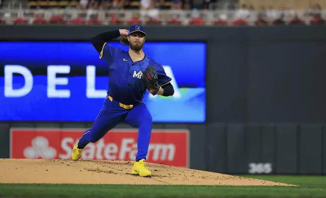 Minnesota Twins starting pitcher Bailey Ober delivers during the second inning of a baseball game against the Cincinnati Reds, Friday, Sept. 13, 2024, in Minneapolis. (AP Photo/Nikolas Liepins)