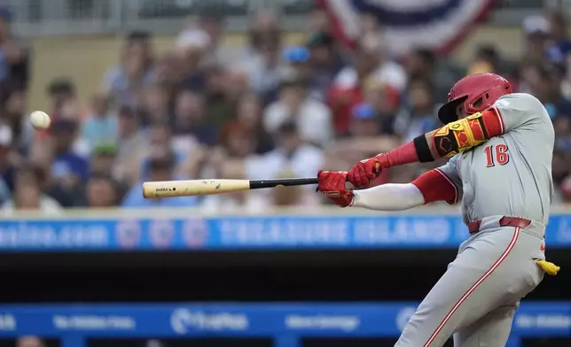 Cincinnati Reds' Noelvi Marte (16) hits a single during the third inning of a baseball game against the Minnesota Twins, Saturday, Sept. 14, 2024, in Minneapolis. (AP Photo/Abbie Parr)