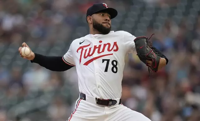 Minnesota Twins starting pitcher Simeon Woods Richardson (78) delivers during the first inning of a baseball game against the Cincinnati Reds, Saturday, Sept. 14, 2024, in Minneapolis. (AP Photo/Abbie Parr)