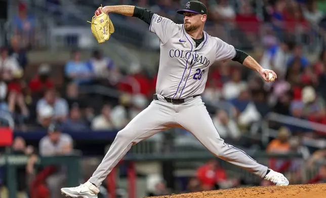 Colorado Rockies pitcher Austin Gomber throws in seventh inning of a baseball game against the Atlanta Braves, Thursday, Sept. 5, 2024, in Atlanta. (AP Photo/Jason Allen)