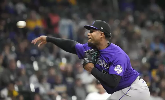 Colorado Rockies pitcher Jaden Hill makes his major league debut during the sixth inning of a baseball game against the Milwaukee Brewers, Saturday, Sept. 7, 2024, in Milwaukee. (AP Photo/Kayla Wolf)