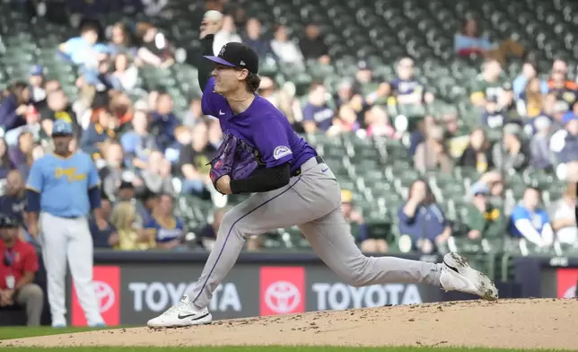 Colorado Rockies pitcher Ryan Feltner throws during the first inning of a baseball game against the Milwaukee Brewers, Friday, Sept. 6, 2024, in Milwaukee. (AP Photo/Kayla Wolf)