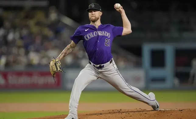 Colorado Rockies starting pitcher Kyle Freeland throws during the first inning of a baseball game against the Los Angeles Dodgers in Los Angeles, Friday, Sept. 20, 2024. (AP Photo/Ashley Landis)