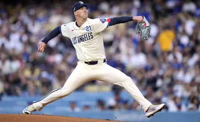 Los Angeles Dodgers starting pitcher Walker Buehler throws to the plate during the first inning of a baseball game against the Colorado Rockies, Saturday, Sept. 21, 2024, in Los Angeles. (AP Photo/Mark J. Terrill)