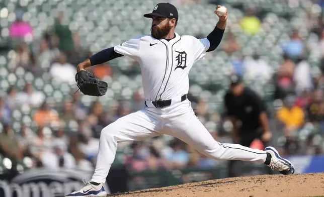 Detroit Tigers pitcher Sean Guenther throws against the Colorado Rockies in the seventh inning of a baseball game, Thursday, Sept. 12, 2024, in Detroit. (AP Photo/Paul Sancya)