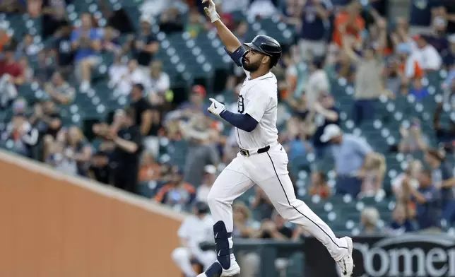 Detroit Tigers' Riley Greene rounds the bases after hitting a home run against the Colorado Rockies during the first inning of a baseball game, Wednesday, Sept. 11, 2024, in Detroit. (AP Photo/Duane Burleson)