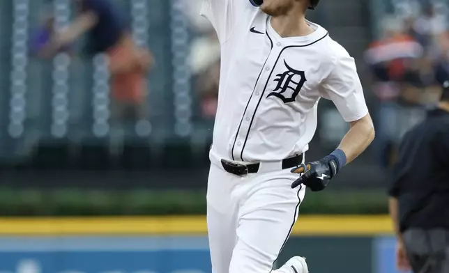 Detroit Tigers' Parker Meadows rounds the bases after hitting a home run against the Colorado Rockies during the first inning of a baseball game, Tuesday, Sept. 10, 2024, in Detroit. (AP Photo/Duane Burleson)