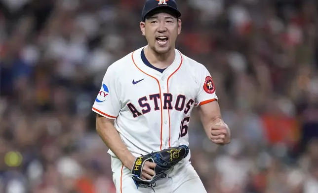 Houston Astros starting pitcher Yusei Kikuchi reacts after striking out Kansas City Royals' Bobby Witt Jr. to end the top of the sixth inning of a baseball game Saturday, Aug. 31, 2024, in Houston. (AP Photo/Eric Christian Smith)