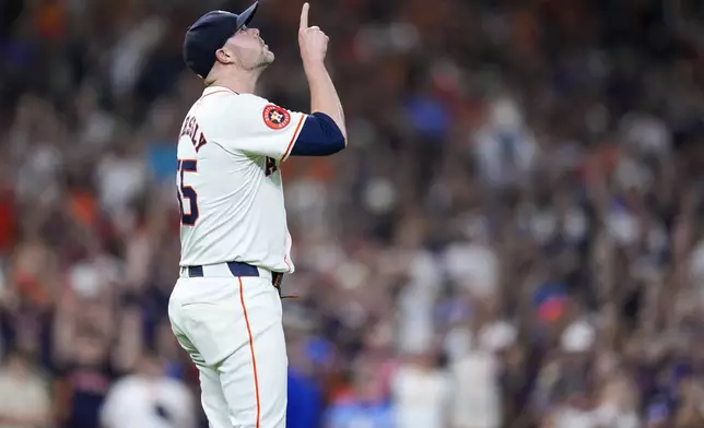 Houston Astros relief pitcher Ryan Pressly reacts after the final out of a win over the Kansas City Royals in a baseball game Saturday, Aug. 31, 2024, in Houston. (AP Photo/Eric Christian Smith)