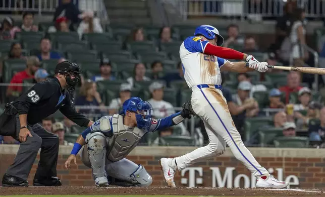 Atlanta Braves' Matt Olson swings at a pitch called strike in the fourth inning of a baseball game against the Kansas City Royals, Saturday, Sept. 28, 2024, in Atlanta. (AP Photo/Jason Allen)